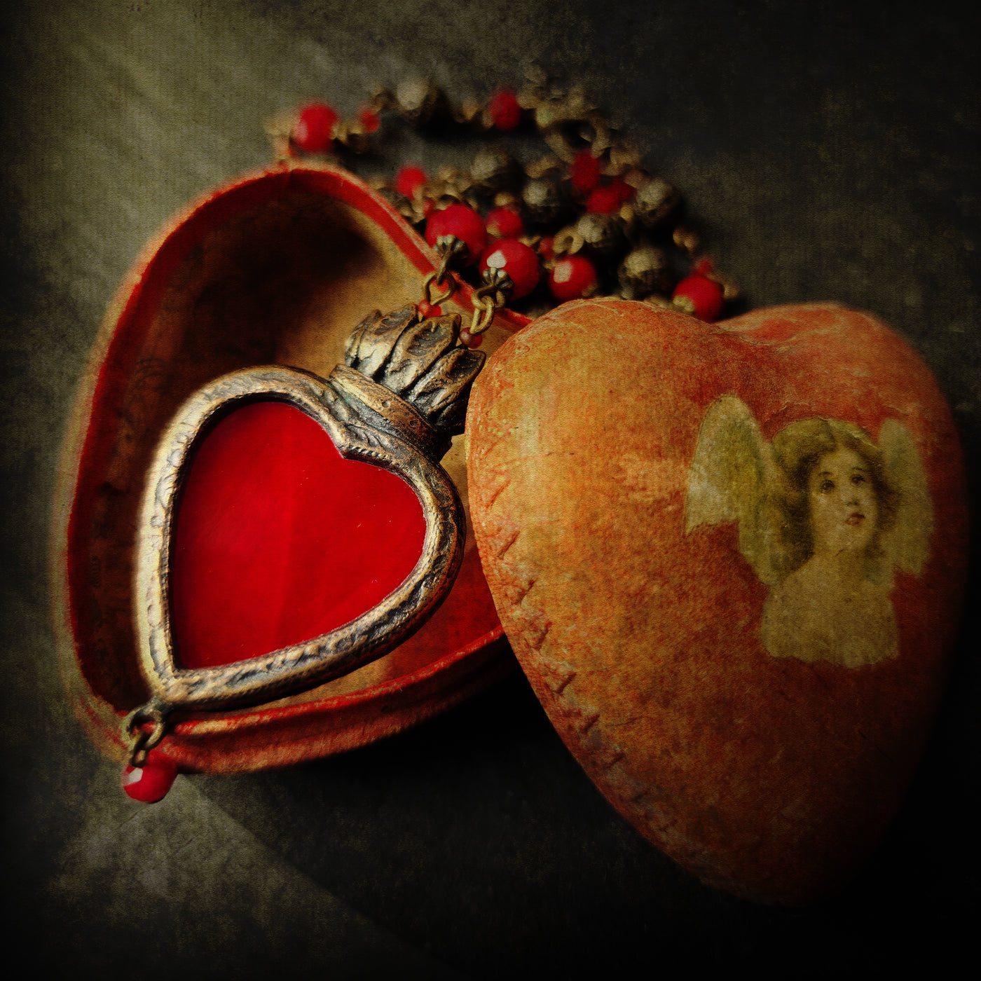 the heart's flame - a sacred heart amulet