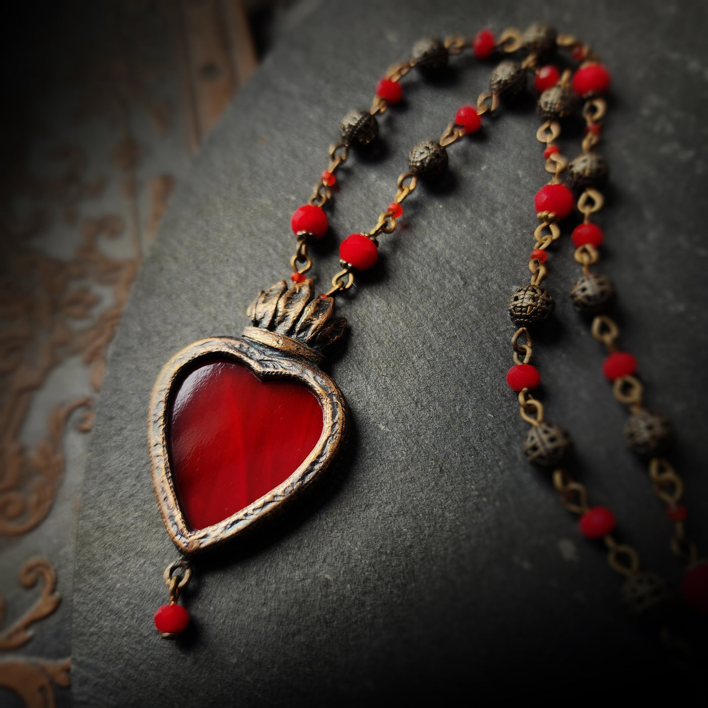 the heart's flame - a sacred heart amulet