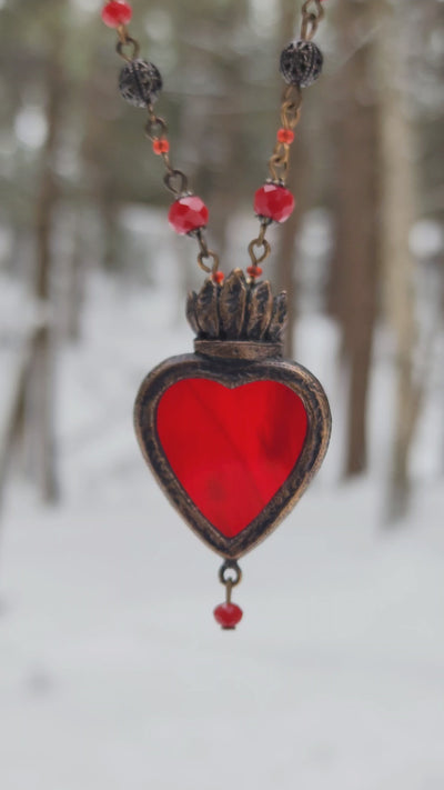 the heart's flame - a sacred heart amulet