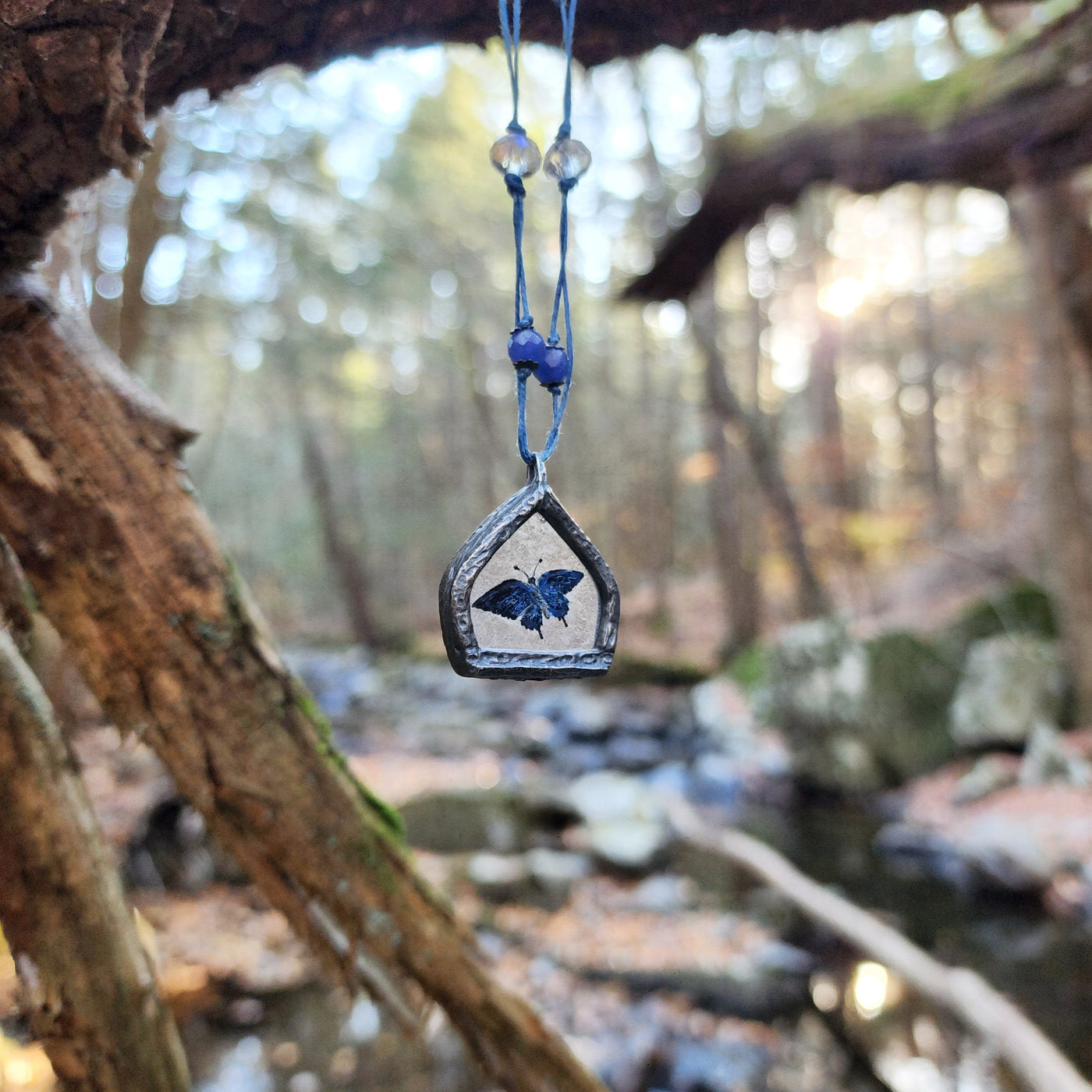 to fly again - enameled butterfly arch amulet